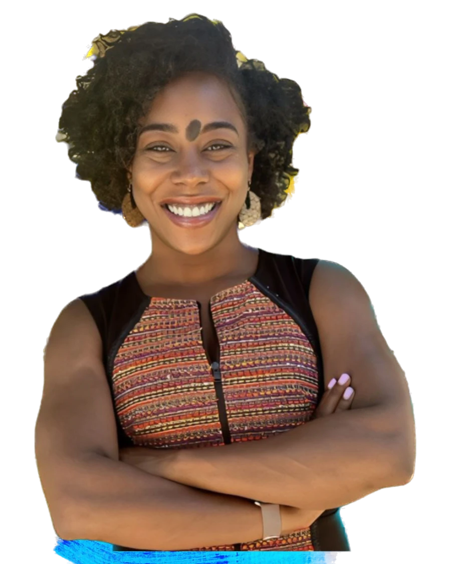 Portrait of Dr. Leia D. Belt, PhD, smiling with arms crossed